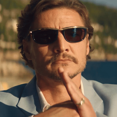 Pedro Pascal Nicolas Cage Nodding With Shades GIF