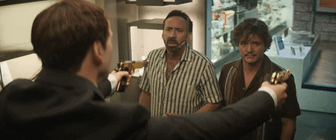 Pedro Pascal Nicolas Cage Two Guns Pointed GIF