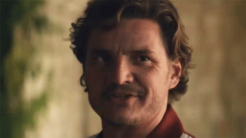 Pedro Pascal Nicolas Cage Wicked Grin GIF