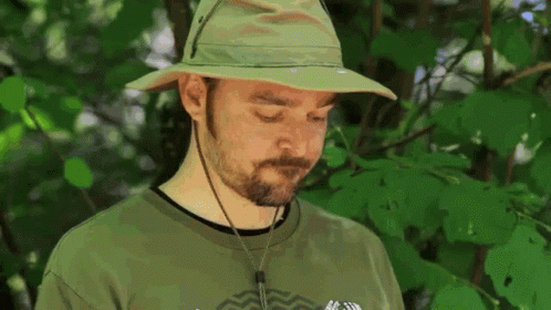 Pee Trying To Shoot In A Tumbler GIF