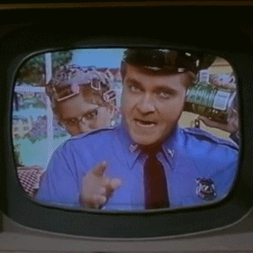 Pee Wee Herman And Police On Can Phones GIF