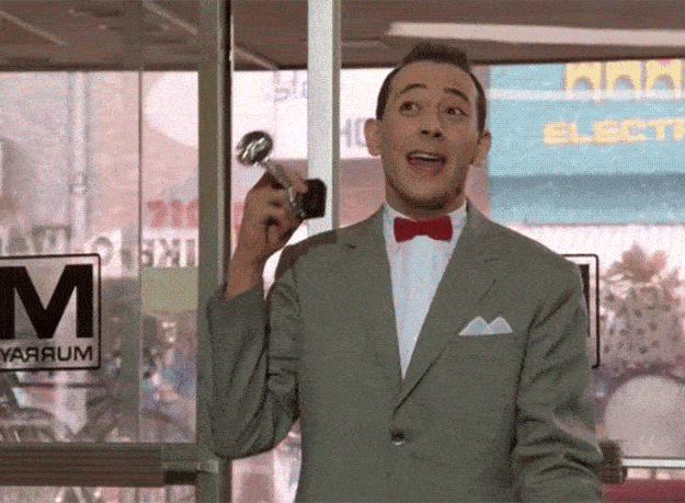 Pee Wee Herman Holding Bicycle Horn GIF