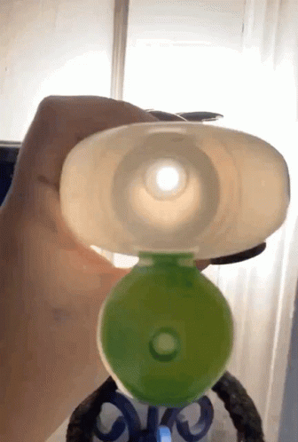 Peeping Inside Lotion Bottle GIF