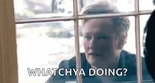 Peeping Tom Conan O'brien Whatchya Doing GIF