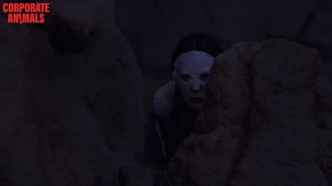 Peeping Tom Masked Man Hiding Behind Rock GIF