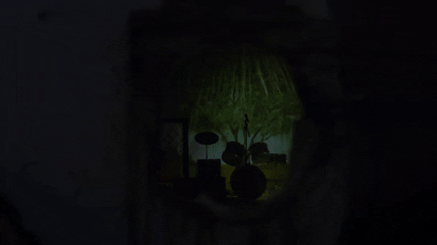 Peeping Tom Snooping Behind Door Loop GIF
