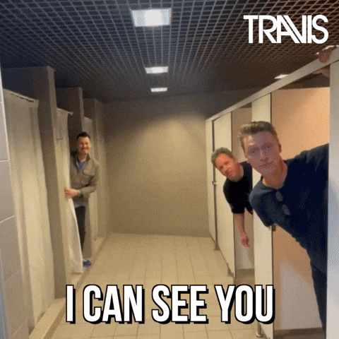 Peeping Tom Travis Can See You GIF