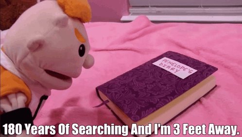 Penelope's Diary on Bed Next to Stuffed Animal