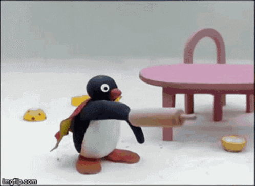 Penguin Holding Rolling Pin