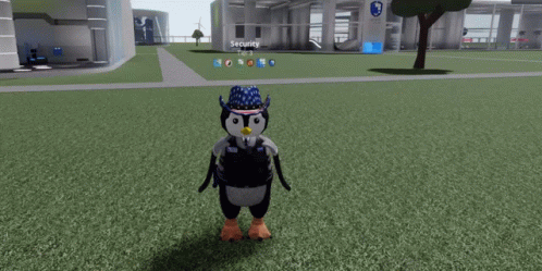 Penguin in Blue White Red Hat at Security Building