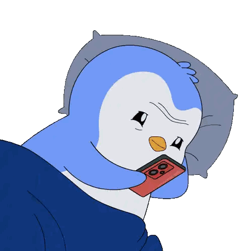 Penguin Lying in Bed with Nintendo Switch