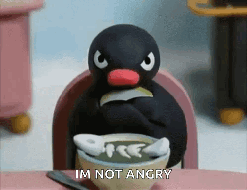 Penguin Sitting at Table Saying Im Not Angry