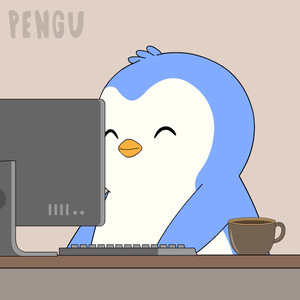 Penguin Sitting in Front of Computer