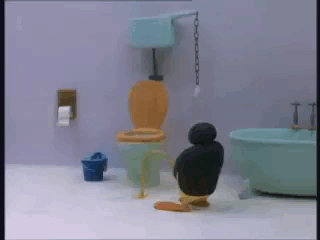 Penguin Sitting on Toilet