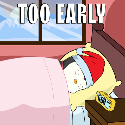 Penguin Sleeping Next to Alarm Clock 6:08