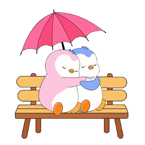 Penguins Sitting Under Umbrella