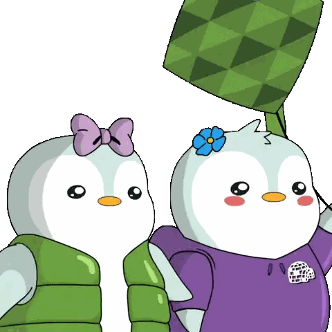 Penguins Standing Next To Each Other