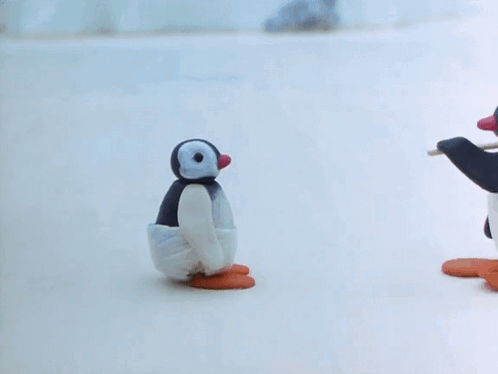 Penguins Standing Next to Each Other