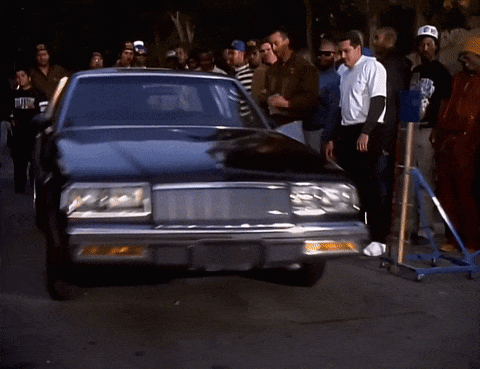 People Around Black Car With NYC Plate GIF