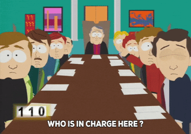 People At Table Saying 110 Who Is In Charge Here GIF