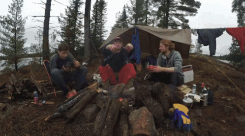 People by Campfire Clothesline