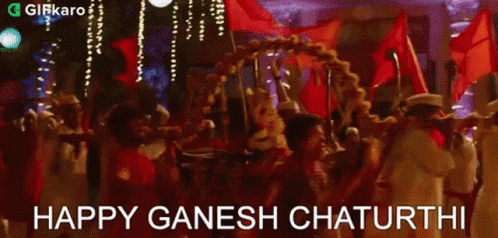 People Carrying Ganesha Statue on a Carriage