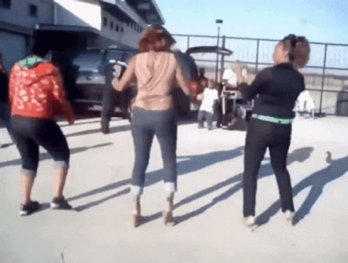 People Dancing Gracefully In Choreographed Moves GIF