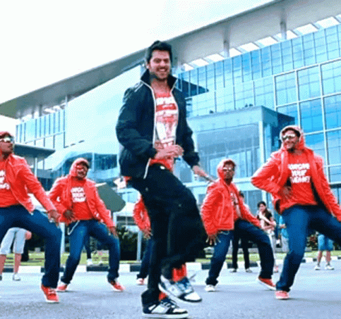 People Dancing In Front Of Building GIF