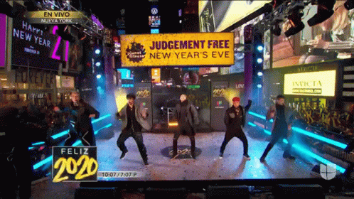 People Dancing In Front Of Judgement Free Sign GIF