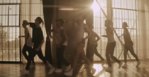 People Dancing In Front Of Window GIF