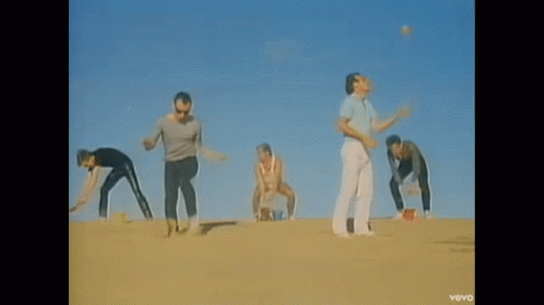 People Dancing on Beach