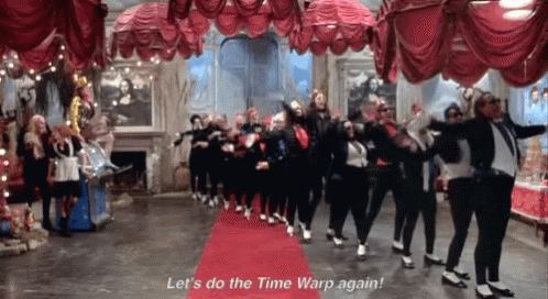 People Dancing on Red Carpet Let's Do the Time Warp Again