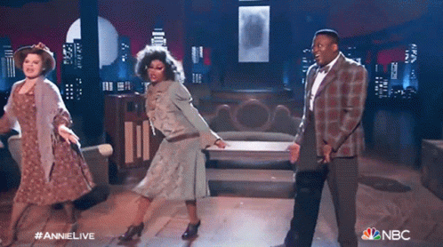 People Dancing on Stage With NBC Logo