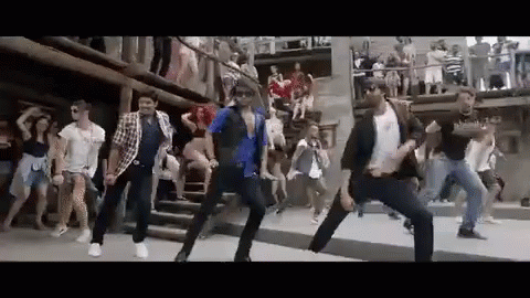 People Dancing On Street Before Crowd GIF