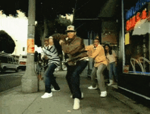 People Dancing Outside Store Sale