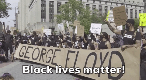 People Displaying Long Sign Saying George Floyd GIF