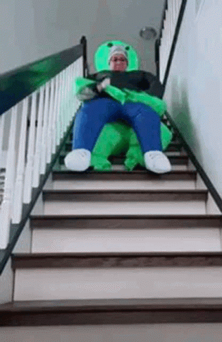 People Falling Alien Suit Stair Slide Fail GIF