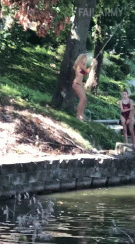 People Falling Lake Rope Swing Mishap GIF