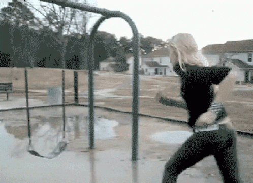 People Falling Playground Swing Mishap GIF