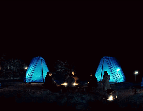 People Gathering Around Campfire