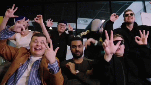 People Giving OK Sign