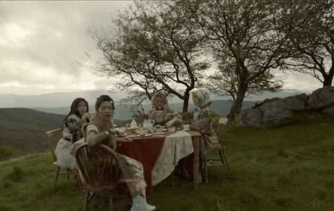 People Having Tea Party On Mountain GIF