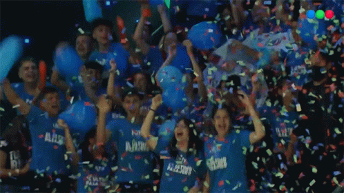 People in Blue Shirts Saying Flying Flowers