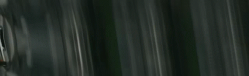 People In Bunny Masks By Cars And Building GIF