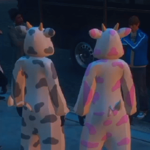 People in Cow Costumes Standing