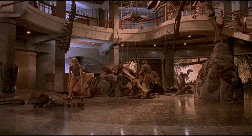People In Front Of Dinosaur GIF