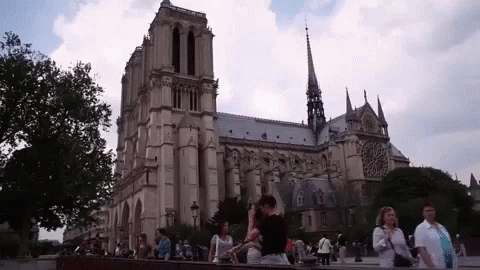People in Front of Large Cathedral