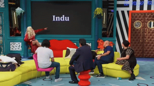 People In Front Of Screen With Indu