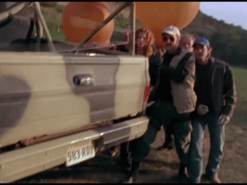 People In Front Of Truck With 583 RDN