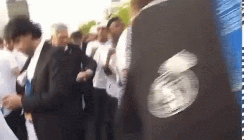 People in Line, Person in Black Jacket With Face